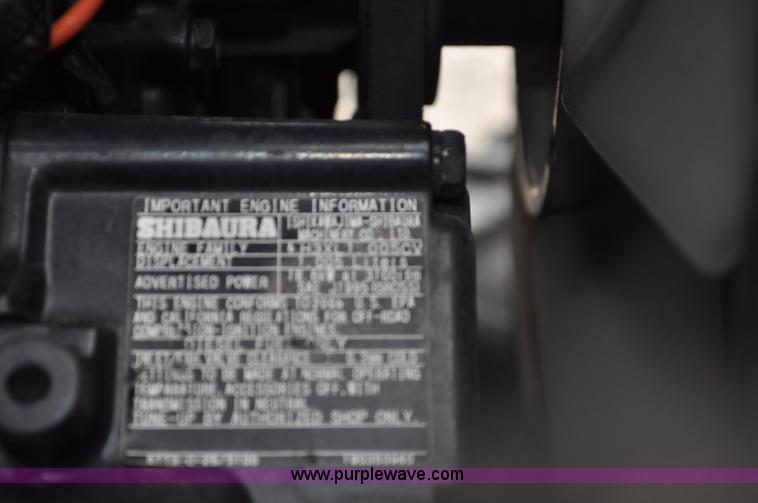 image for item F2291 2005 New Holland TZ25DA MFWD tractor