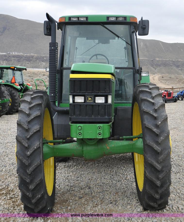 image for item F2292 2000 John Deere 7510 MFWD tractor