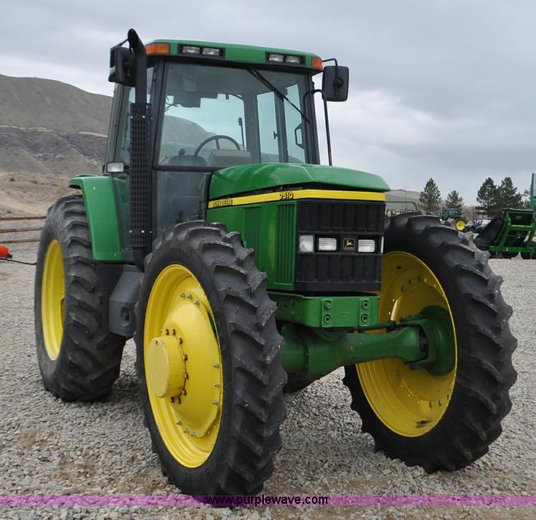 image for item F2292 2000 John Deere 7510 MFWD tractor