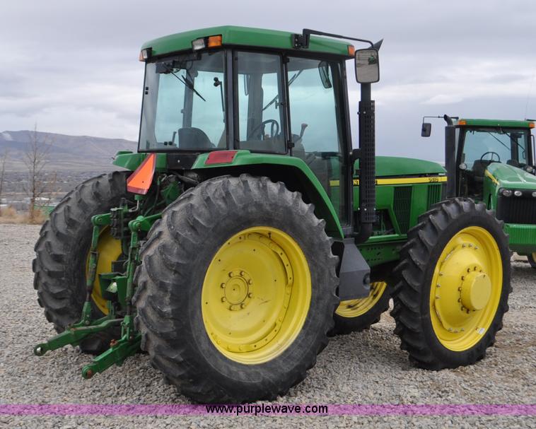 image for item F2292 2000 John Deere 7510 MFWD tractor
