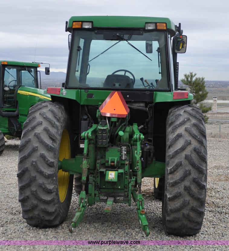 image for item F2292 2000 John Deere 7510 MFWD tractor