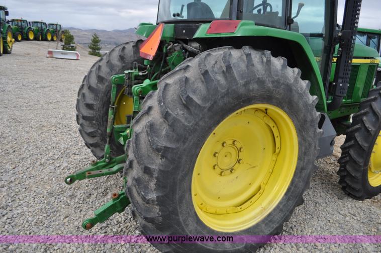 image for item F2292 2000 John Deere 7510 MFWD tractor