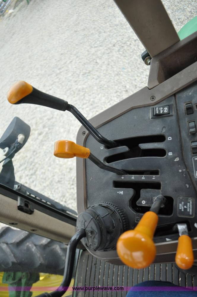 image for item F2292 2000 John Deere 7510 MFWD tractor