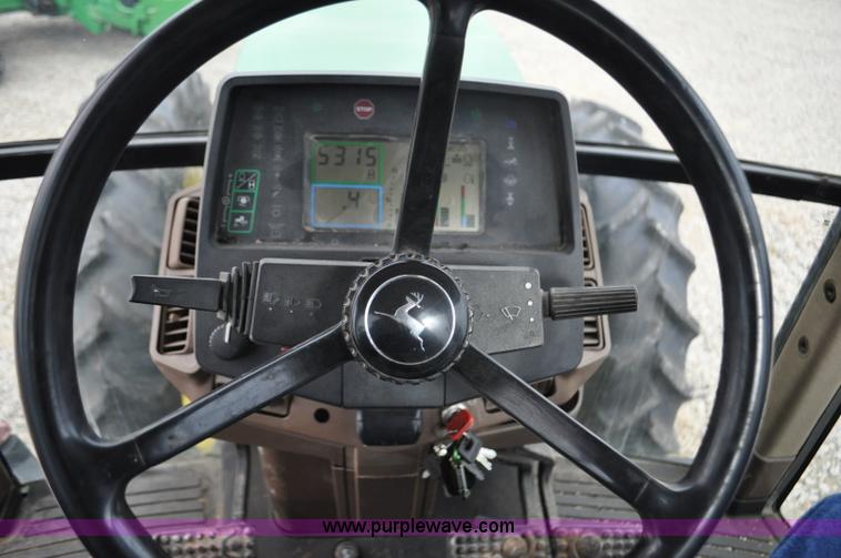 image for item F2292 2000 John Deere 7510 MFWD tractor
