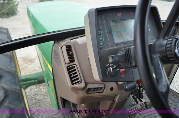 image for item F2292 2000 John Deere 7510 MFWD tractor