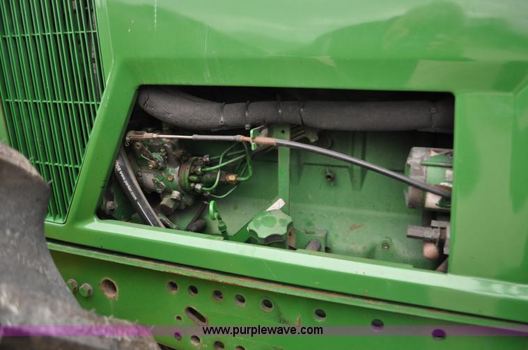 image for item F2292 2000 John Deere 7510 MFWD tractor