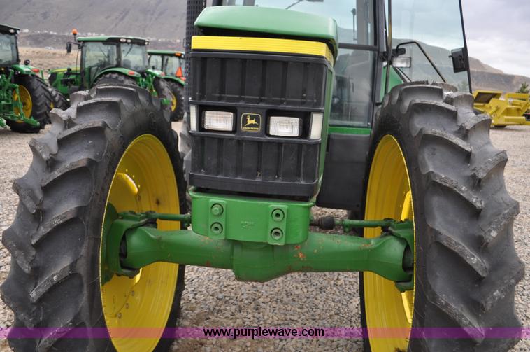 image for item F2292 2000 John Deere 7510 MFWD tractor