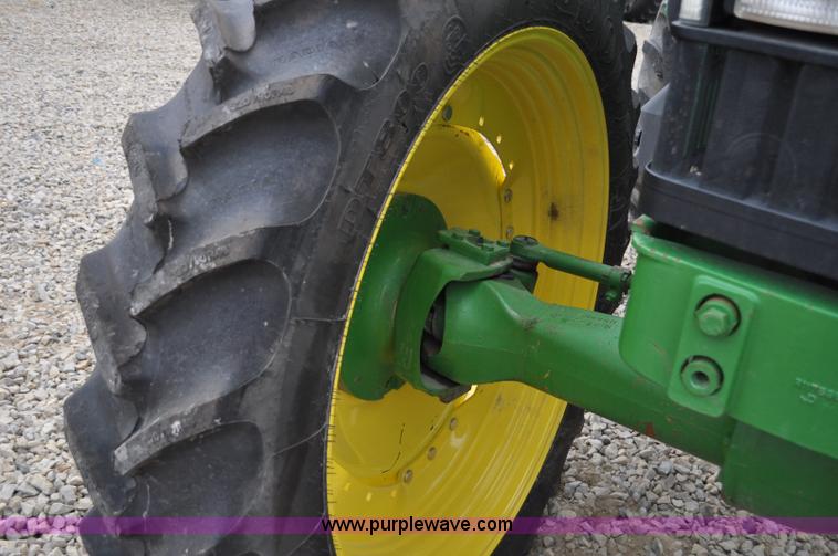 image for item F2292 2000 John Deere 7510 MFWD tractor