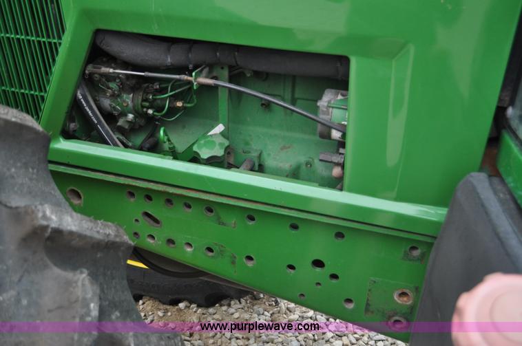 image for item F2292 2000 John Deere 7510 MFWD tractor
