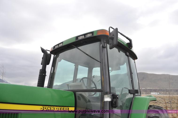 image for item F2292 2000 John Deere 7510 MFWD tractor