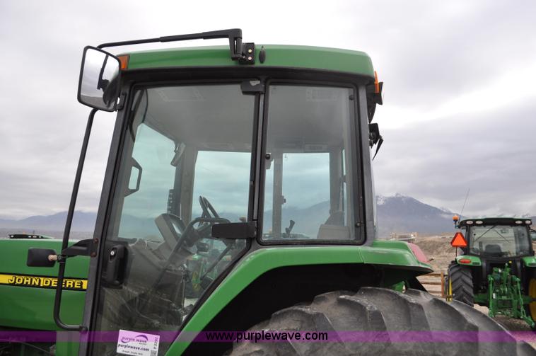 image for item F2292 2000 John Deere 7510 MFWD tractor