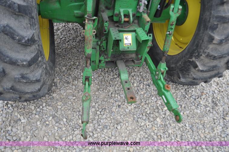 image for item F2292 2000 John Deere 7510 MFWD tractor