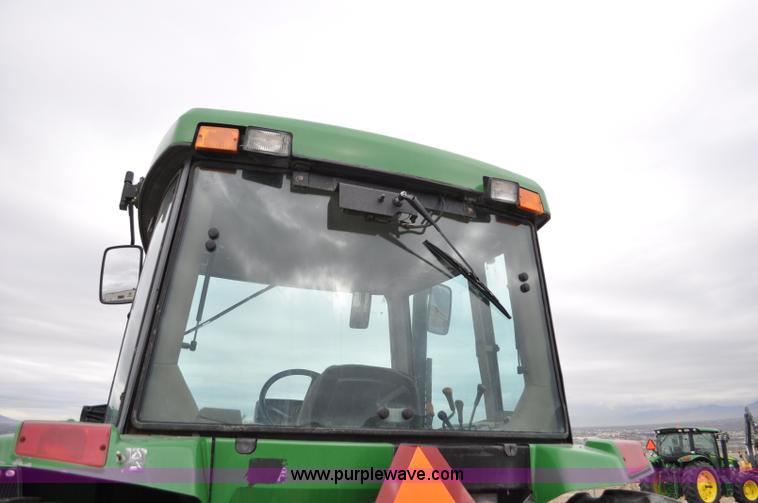image for item F2292 2000 John Deere 7510 MFWD tractor
