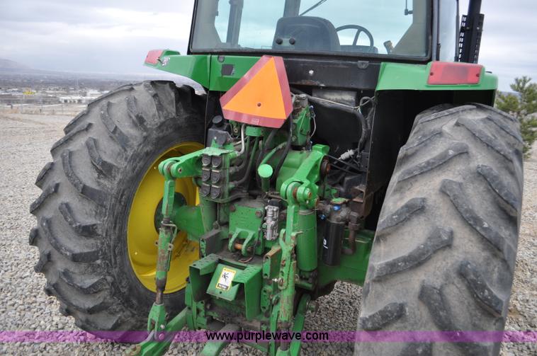 image for item F2292 2000 John Deere 7510 MFWD tractor