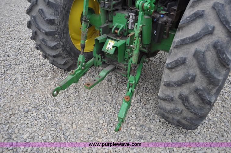 image for item F2292 2000 John Deere 7510 MFWD tractor