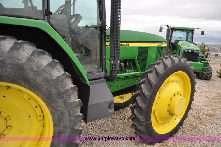 image for item F2292 2000 John Deere 7510 MFWD tractor