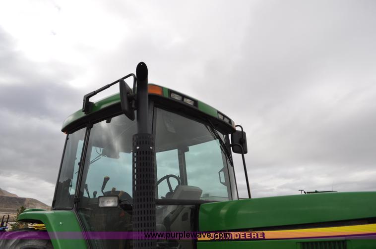 image for item F2292 2000 John Deere 7510 MFWD tractor