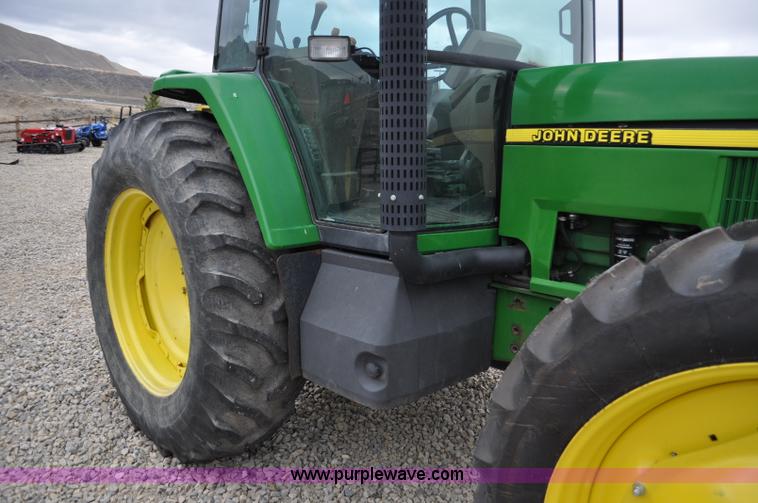 image for item F2292 2000 John Deere 7510 MFWD tractor