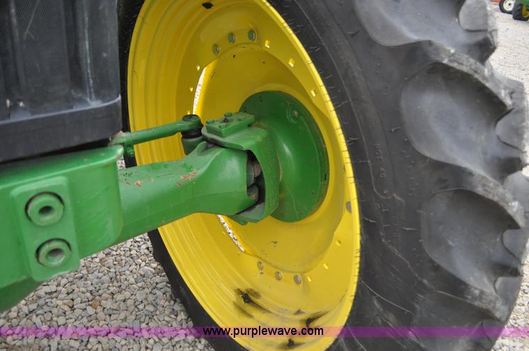 image for item F2292 2000 John Deere 7510 MFWD tractor