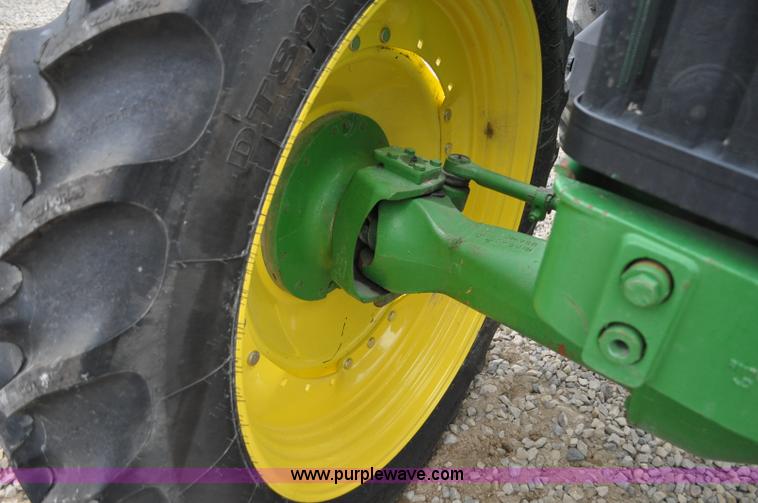 image for item F2292 2000 John Deere 7510 MFWD tractor