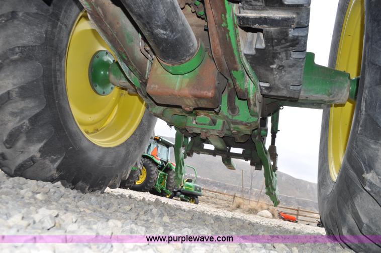 image for item F2292 2000 John Deere 7510 MFWD tractor