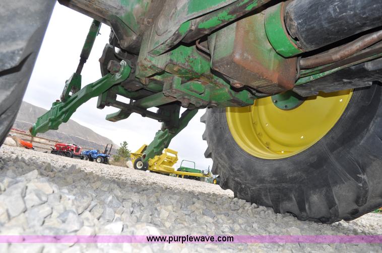 image for item F2292 2000 John Deere 7510 MFWD tractor