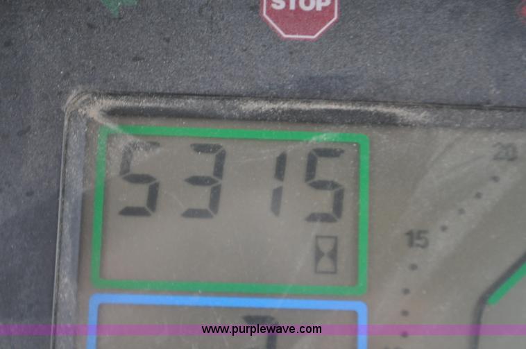 image for item F2292 2000 John Deere 7510 MFWD tractor