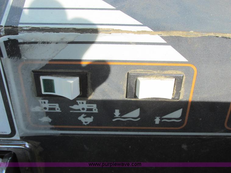 image for item H8676 New Holland 2550 Speed Rower self-propelled swather