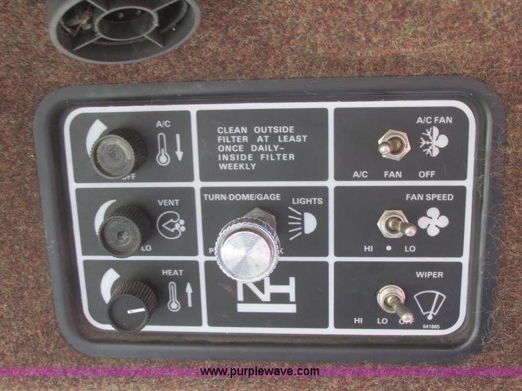 image for item H8676 New Holland 2550 Speed Rower self-propelled swather