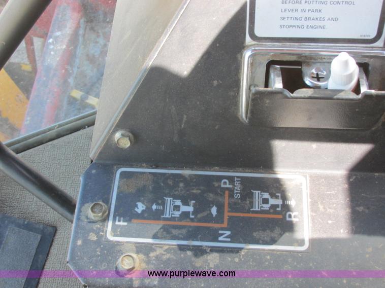 image for item H8676 New Holland 2550 Speed Rower self-propelled swather