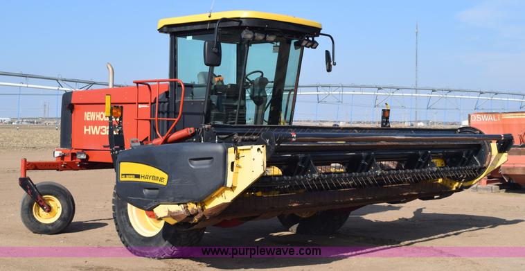 image for item K2432 2003 New Holland HW320 self-propelled windrower