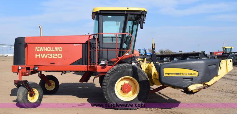 image for item K2432 2003 New Holland HW320 self-propelled windrower