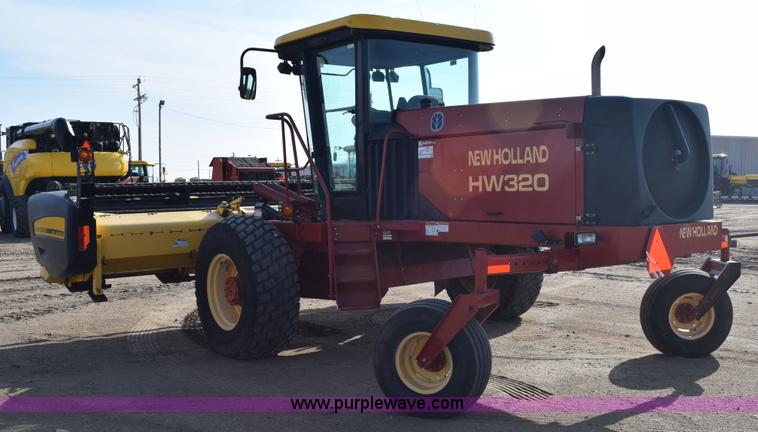 image for item K2432 2003 New Holland HW320 self-propelled windrower