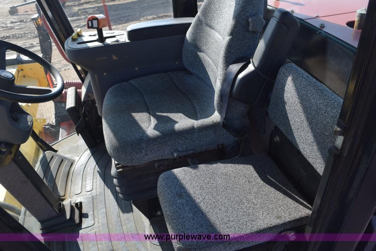 image for item K2432 2003 New Holland HW320 self-propelled windrower