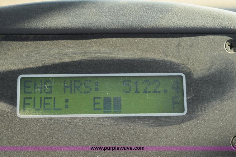 image for item K2432 2003 New Holland HW320 self-propelled windrower