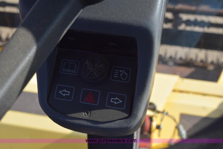 image for item K2432 2003 New Holland HW320 self-propelled windrower