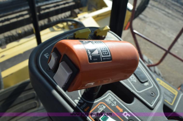 image for item K2432 2003 New Holland HW320 self-propelled windrower