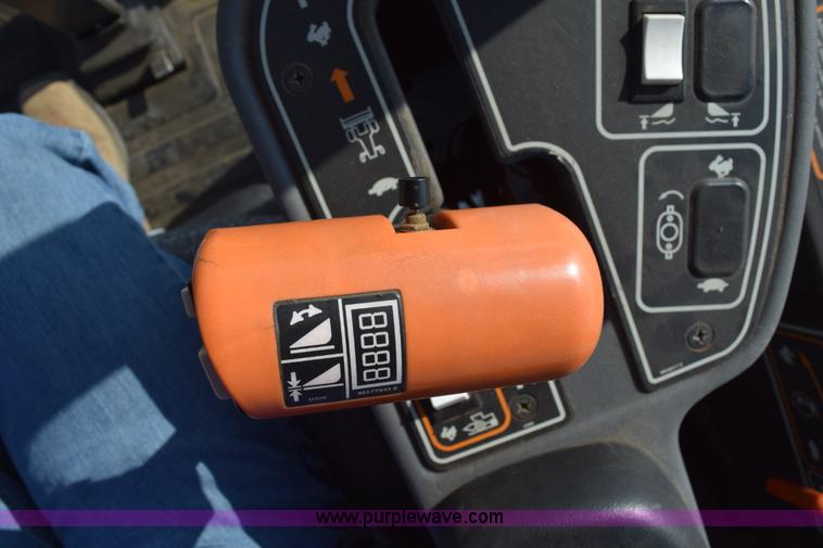 image for item K2432 2003 New Holland HW320 self-propelled windrower