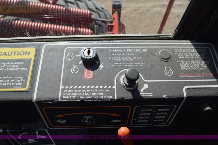 image for item K2432 2003 New Holland HW320 self-propelled windrower