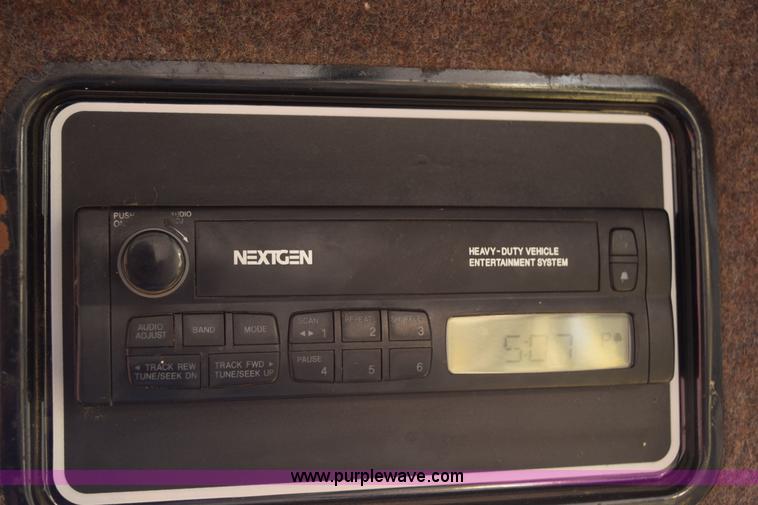 image for item K2432 2003 New Holland HW320 self-propelled windrower