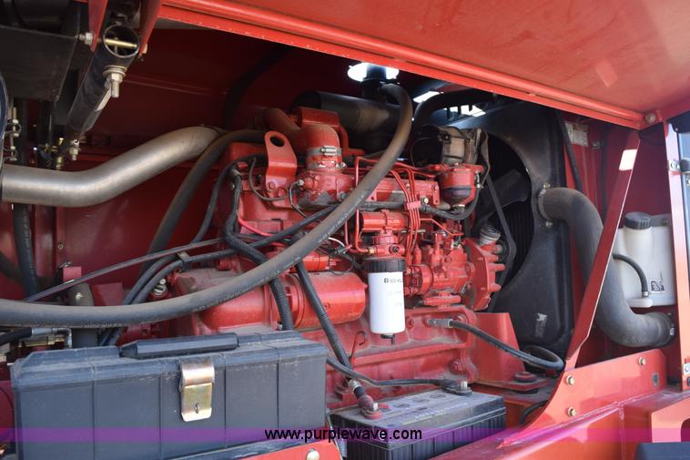 image for item K2432 2003 New Holland HW320 self-propelled windrower