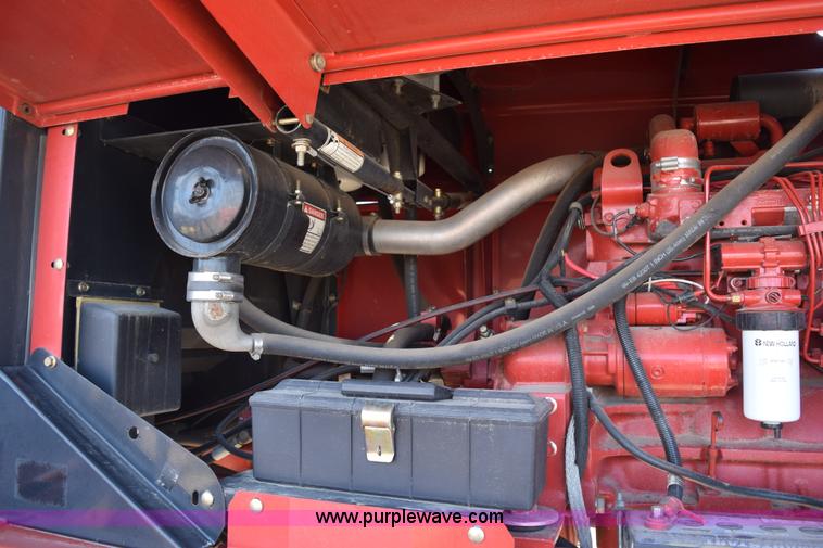 image for item K2432 2003 New Holland HW320 self-propelled windrower