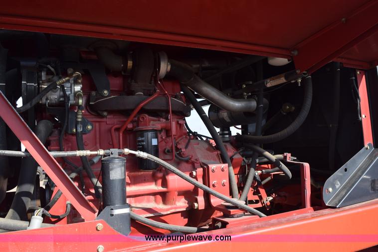 image for item K2432 2003 New Holland HW320 self-propelled windrower