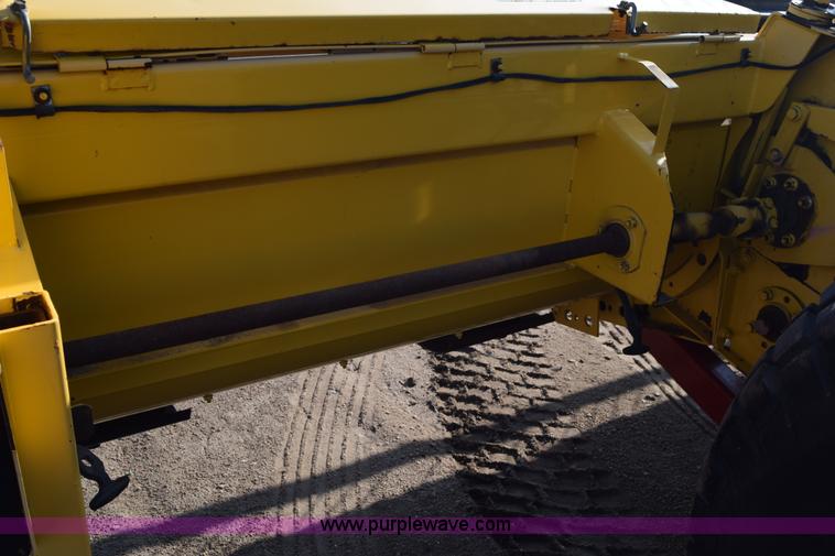 image for item K2432 2003 New Holland HW320 self-propelled windrower