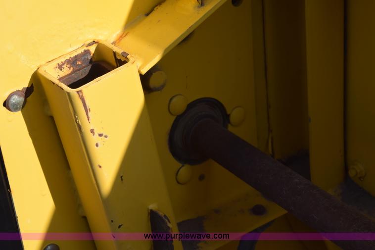 image for item K2432 2003 New Holland HW320 self-propelled windrower