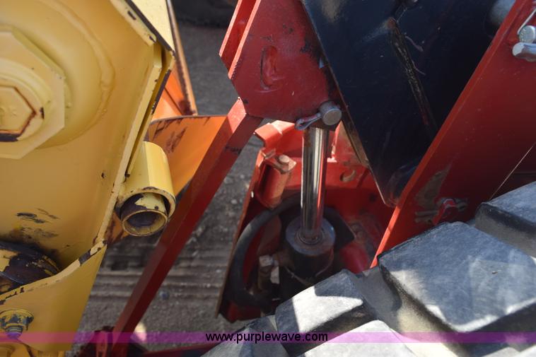 image for item K2432 2003 New Holland HW320 self-propelled windrower