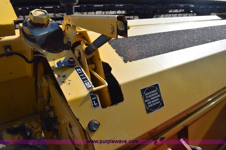 image for item K2432 2003 New Holland HW320 self-propelled windrower