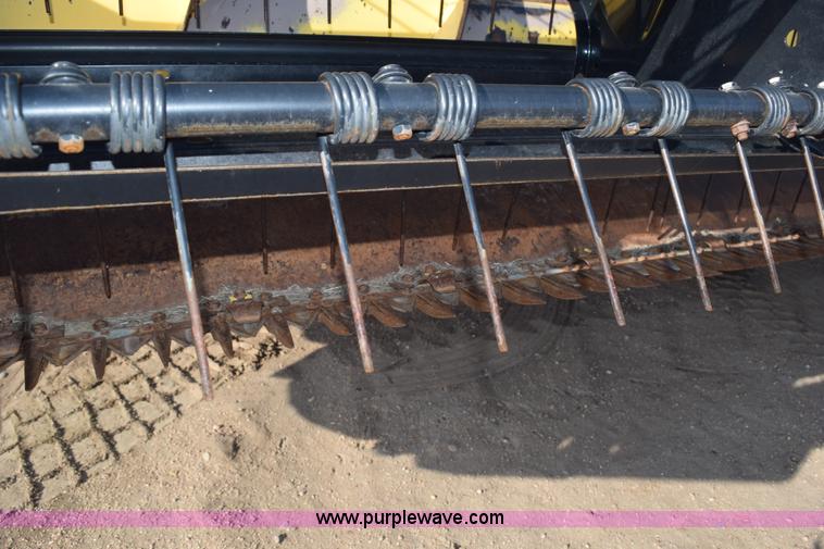 image for item K2432 2003 New Holland HW320 self-propelled windrower