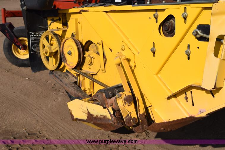 image for item K2432 2003 New Holland HW320 self-propelled windrower