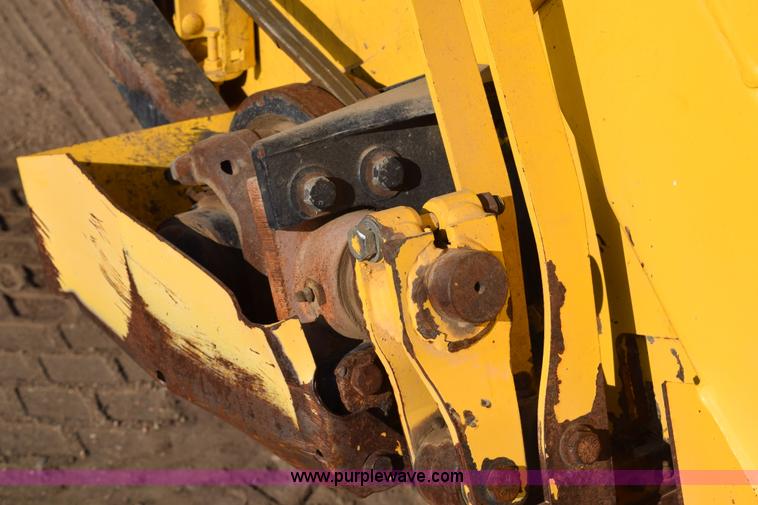 image for item K2432 2003 New Holland HW320 self-propelled windrower